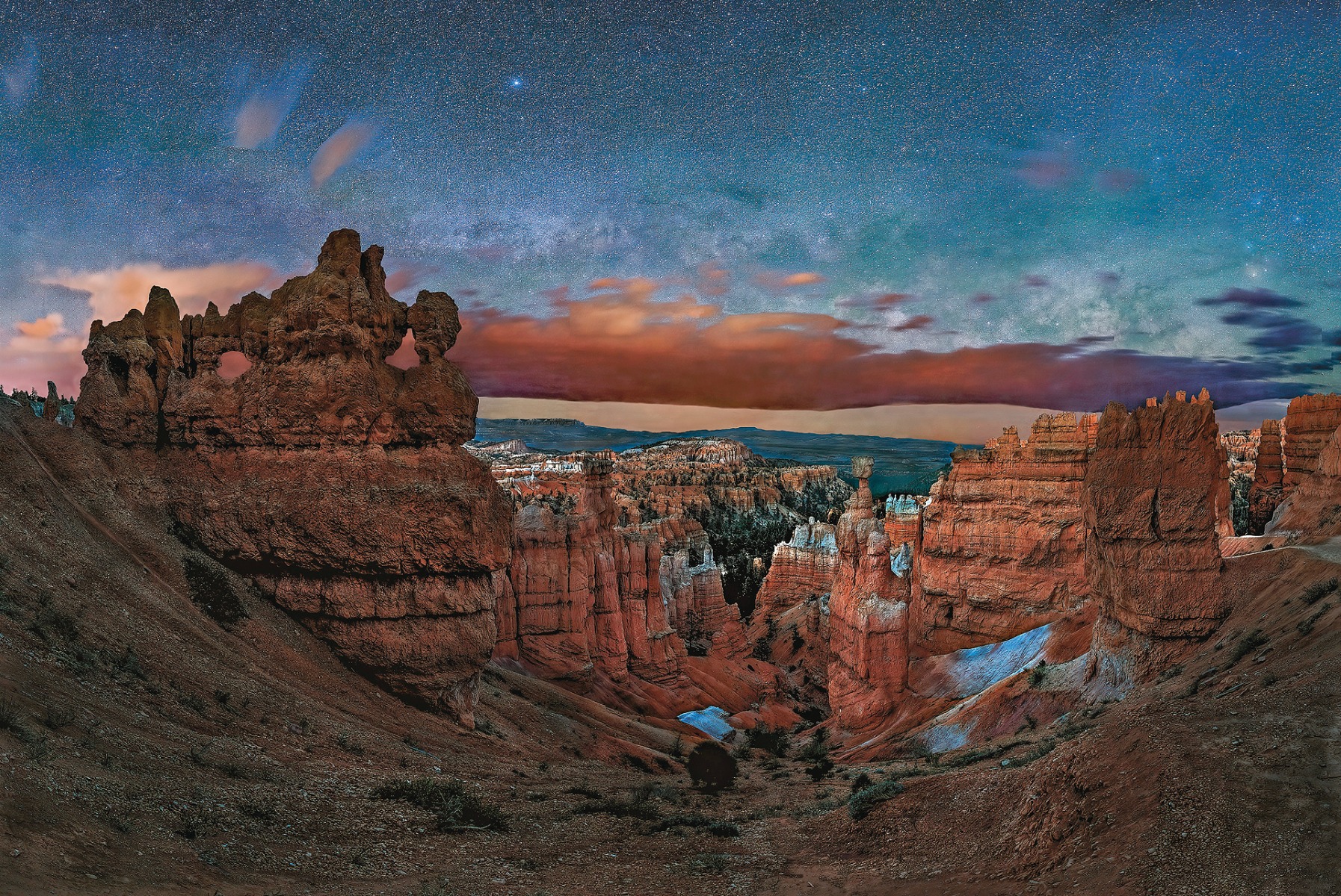 The Milky Way rises above Thor’s Hammer and other formations in Bryce Canyon National Park during astronomical twilight, the latest stage of twilight.