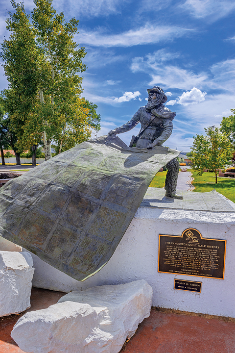 A sculpture by artist Stanley Q. Johnson at Quilt Walk Park in Panguitch commemorates the 1864 trek by seven men searching for supplies to save their starving families.