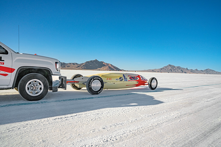 Russell Nelson starts a run in his family’s F Fuel Lakester, made of a recycled aircraft fuel drop tank. With the salt ahead, he hopes to someday break the 223 mph record.