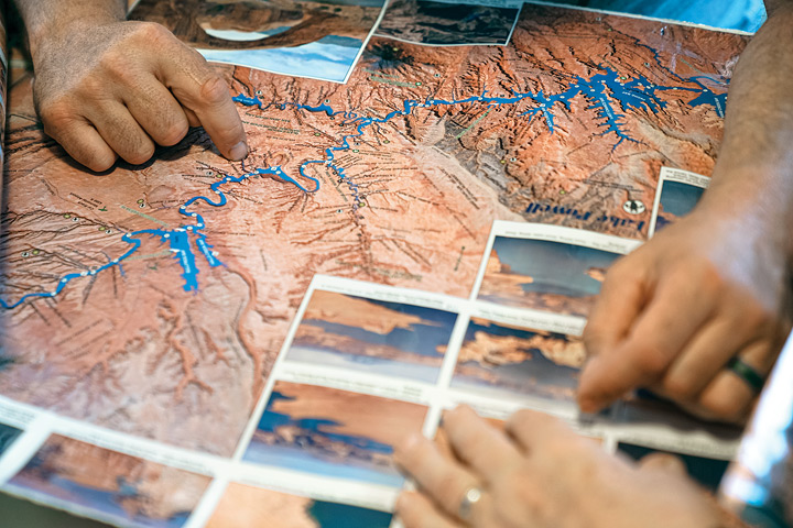 The brothers plot out their next campsite along Lake Powell. 